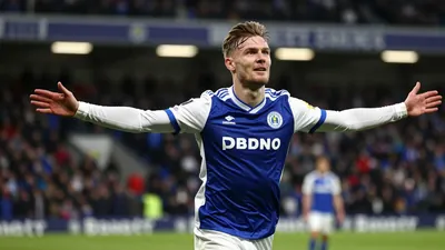 Joe Taylor's hat-trick earned Huddersfield Town a 3-1 victory against Oxford United, moving them to first place in League...