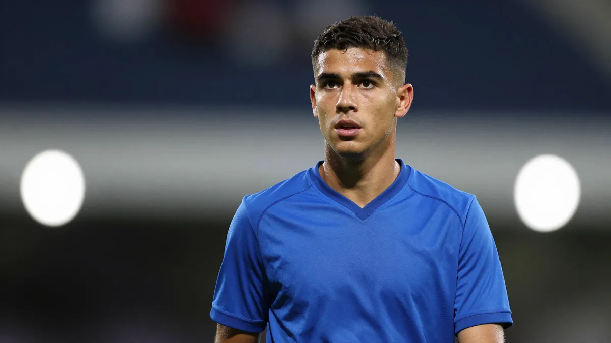 Huddersfield Town's Tom Iorpenda draws Derby County interest as the 21-year-old seeks a Championship move, sparking...