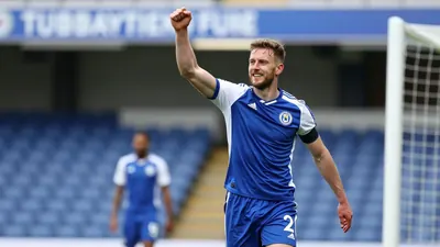 Huddersfield Town faces Cambridge United in a match with various activities, including a sold-out Newmarket Road End and...