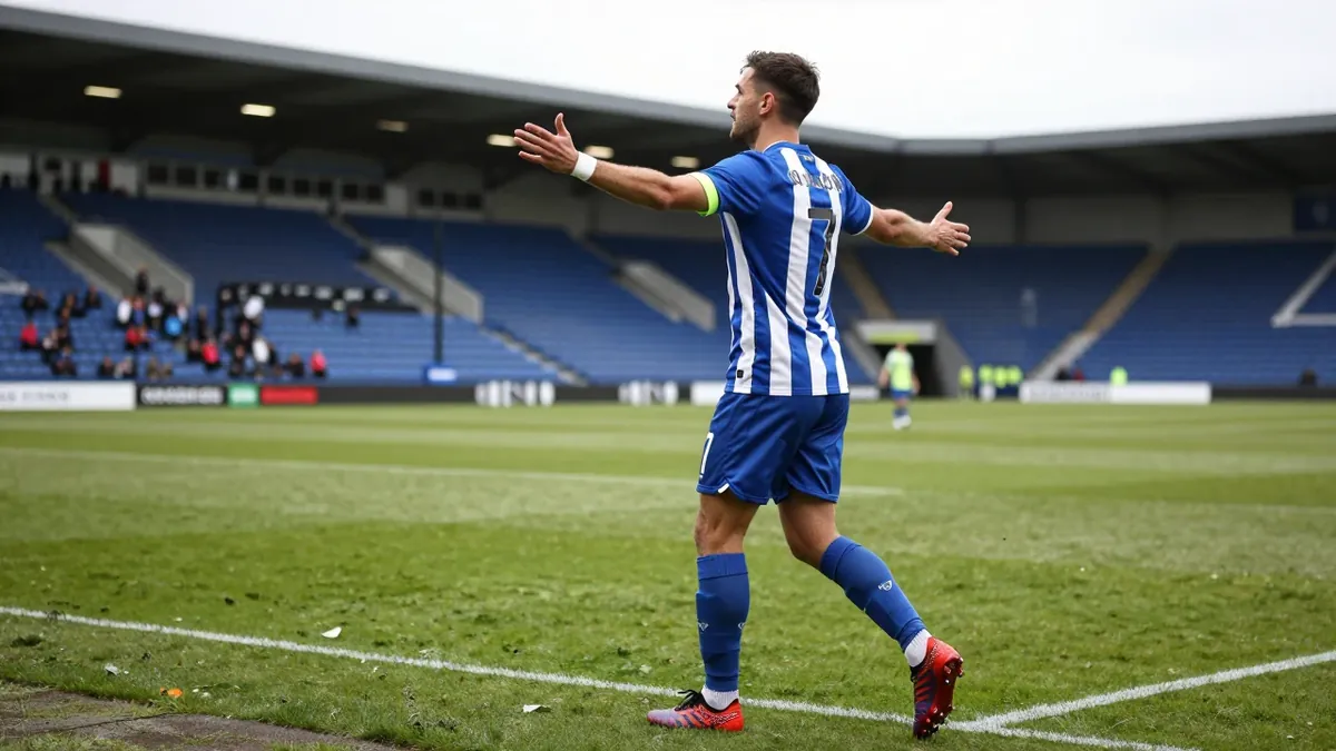 Midfielder Archie Collins says Huddersfield Town's goalless draw with ten-man Mansfield Town was a disappointment, but...